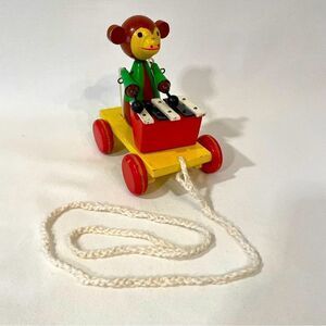 Monkey playing xylophone antique pull toy